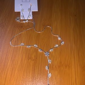 A set of earrings and a necklace